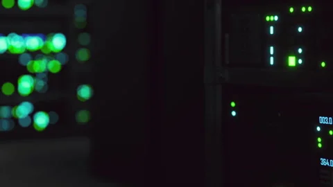 Servers with lights in a data center during nighttime hours Stock Footage 345003515