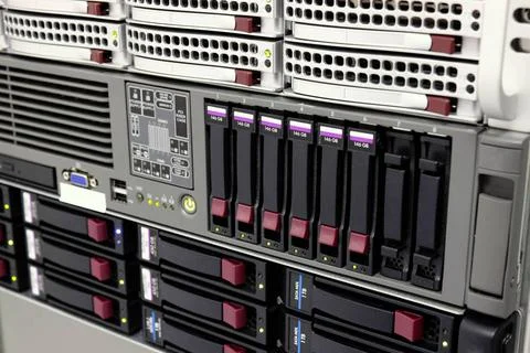 Servers stack with hard drives in a datacenter for backup and data storage... Stockfoto's