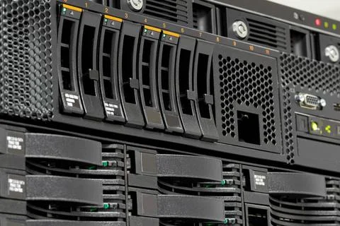 Servers stack with hard drives in a datacenter for backup and data storage... Stockfoto's