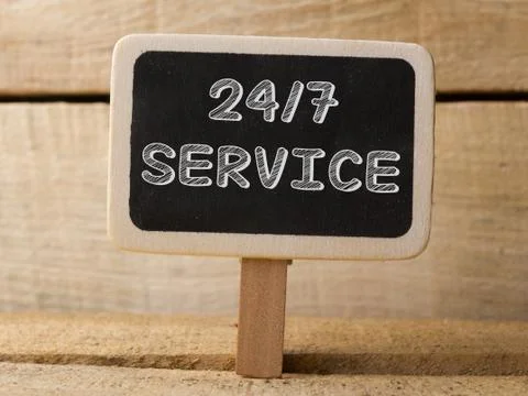 Service 247  text write on Chalkboard at wooden background Photos