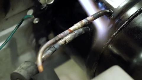 Service center. Electronics repair shops. A man repairs the fridge. Aluminum Stock Footage 82801320