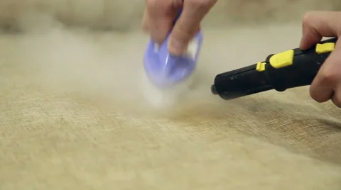 Service cleaning dirty sofa and chairs with special tool Stock Footage 57461341