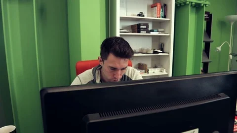 The Service Desk Working at a Computer Stock Footage 75679813