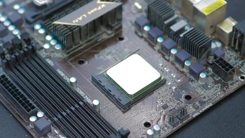 Service engineer installing CPU ( central processing unit ) from motherboard. Video stock 76942175