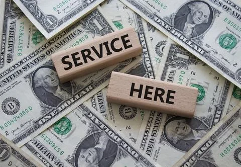 Service here symbol. Concept words Service here on wooden blocks. Beautiful d Stock Photos