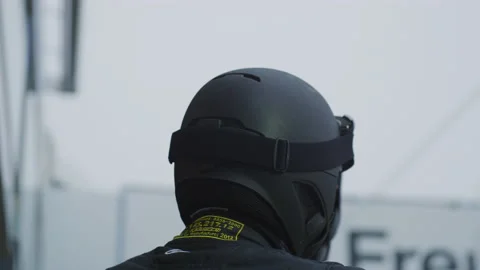 Service Technician with helmets at Pit Stop at Car Racing  - Protection Stock Footage 146527495