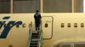 Service Utair aircraft in the hangar. Repair. Airport HD Footage