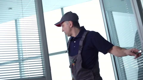 The Service Worker Comes into the Office Stock Footage 62371706