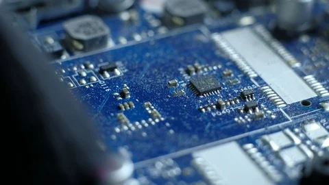 The serviceman cleans the interior of the laptop with dust and other dirt. Stock Footage 97696595
