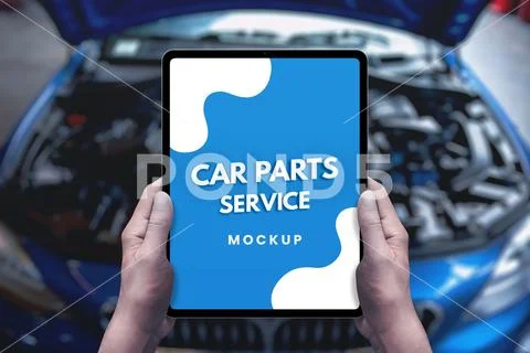 Serviceman holds a tablet mockup in front of a car PSD Template