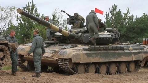 Serviceman near their tanks during the Ukrainian Army exercises on the field. 스톡 동영상 80367027