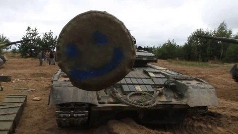 Serviceman near their tanks during the Ukrainian Army exercises on the field. 스톡 동영상 80367118