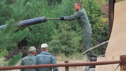 Serviceman near their tanks during the Ukrainian Army exercises on the field. Stock Footage 80367299