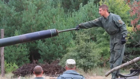 Serviceman near their tanks during the Ukrainian Army exercises on the field. 스톡 동영상 80367342