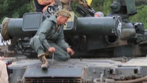 Serviceman near their tanks during the Ukrainian Army exercises on the field. 스톡 동영상 80367438