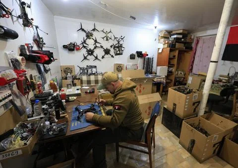 Servicemen of the special unit assembling and debugging FPV drones, Kharkiv, Ukr 写真素材