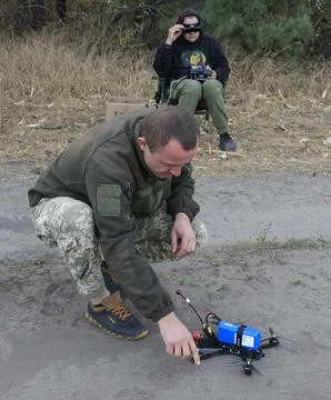 Servicemen of the special unit assembling and debugging FPV drones, Kharkiv, Ukr Stock Photos
