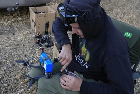Servicemen of the special unit assembling and debugging FPV drones, Kharkiv, Ukr 写真素材
