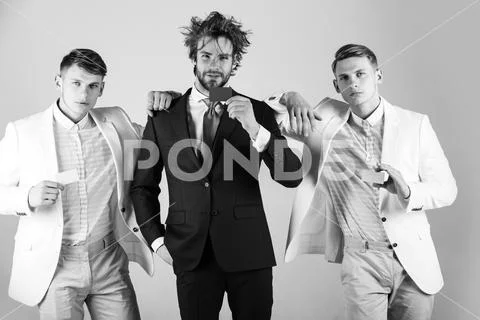 Services for business. Group of businessmen wearing formal suits Stock Photos