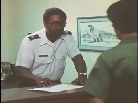 A servicewoman, under the watchful eye of an observer, provides a urine sample Stock Footage 74947304