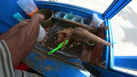 Serving and making peanut butter sauce for bumbu rujak buah, indonesian tra.. Stock Footage 269493988