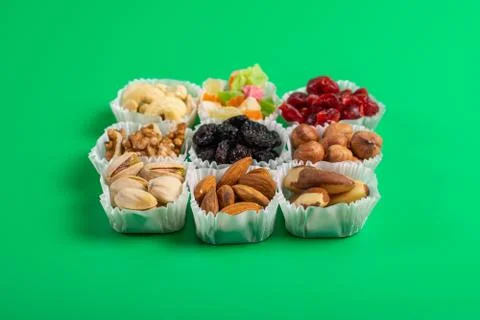 A serving of assorted candied fruit, dried cherries, almonds, raisins, walnut Stock Photos