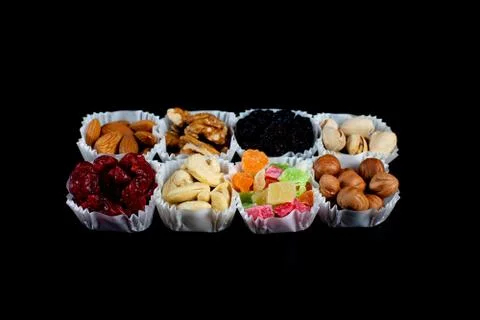 A serving of assorted candied fruit, dried cherries, almonds, raisins, walnut Stock Photos