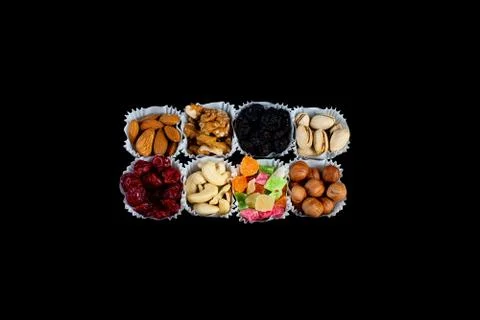 A serving of assorted candied fruit, dried cherries, almonds, raisins, walnut 写真素材