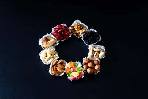 A serving of assorted candied fruit, dried cherries, almonds, raisins, walnut Stock Photos