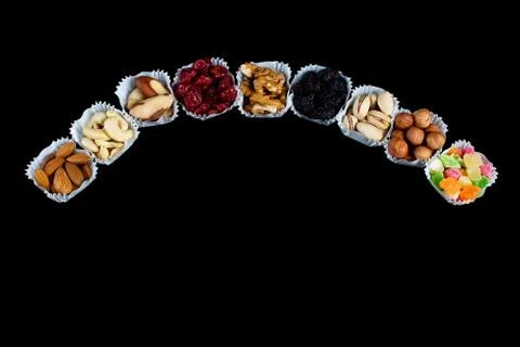 A serving of assorted candied fruit, dried cherries, almonds, raisins, walnut Stock Photos