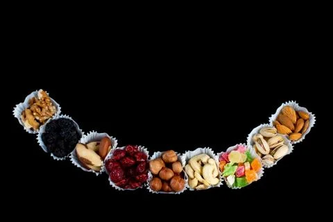 A serving of assorted candied fruit, dried cherries, almonds, raisins, walnut Stock Photos