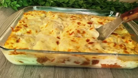 Serving Baked Pasta with Bechamel and Cheese Pull - HD Stock Footage Stock Footage 343925923