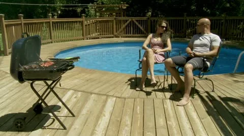 Serving BBQ at Pool Stock Footage 22790285