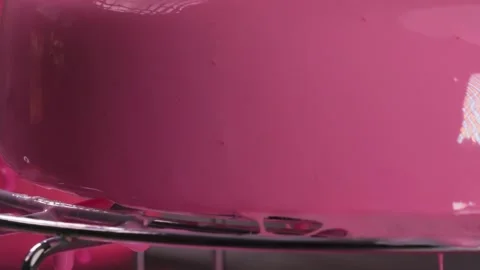 Serving a beautiful shiny pink cake. Advertisement of handmade desserts Stock Footage 272510048
