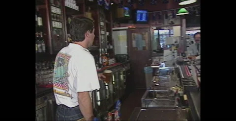 SERVING BEER AT AUSTRALIAN PUB (1990) Stock Footage 240081864