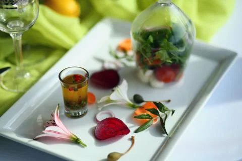 Serving, berry tincture, in bright colors, on the table, food under a glass Stock Photos