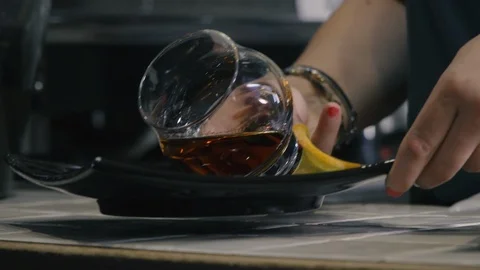 Serving bitter in glass with a slice of orange Stock Footage 87761398