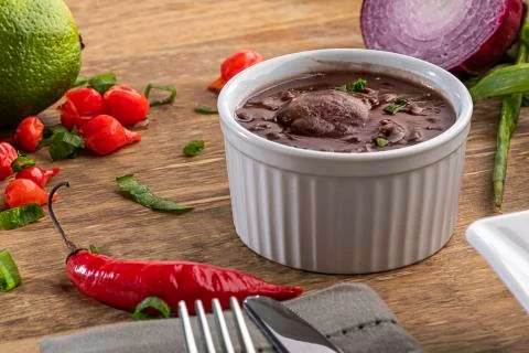 A serving of black bean soup Stock Photos