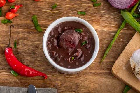 A serving of black bean soup Stock Photos