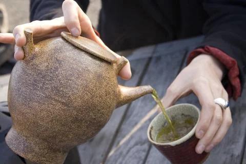 Serving black tea from tea pot pouring in cup, Palace de Italia, Paris, Fr... Stock-Fotos
