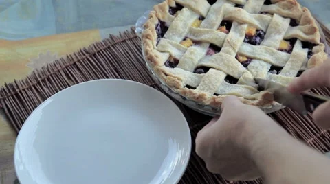 Serving blueberry peach pie Stock Footage 8655729