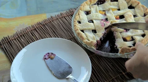 Serving blueberry peach pie Stock Footage 8655740