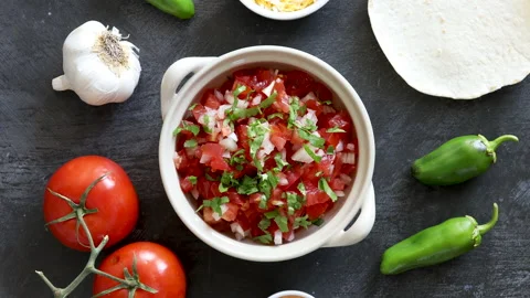 Serving a Bowl of Salsa Stock Footage 170911168