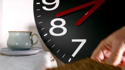 Serving breakfast against a large clock. Stock Footage 102099688