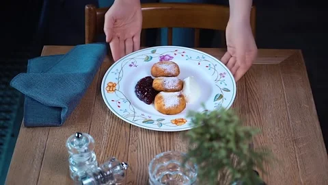 Serving breakfast in a restaurant. Stock Footage 130851852