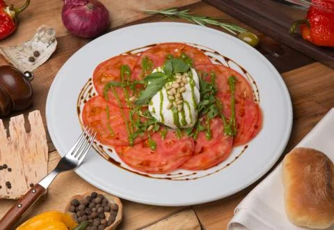 Serving Caprese salad Stock Photos