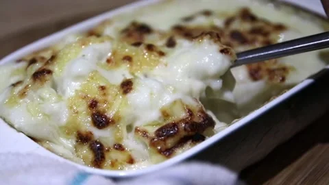 Serving up Cauliflour Cheese Stock Footage 161128373
