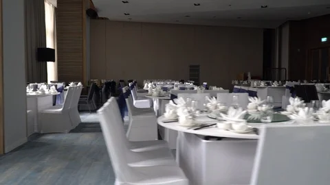 Serving, celebration, anniversary or wedding concept. Banqueting hall. Served Stock Footage 108738908