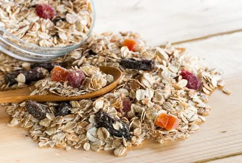 Serving of cereal in bulk on wooden table Stock Photos