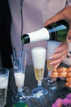 Serving champagne Stock Photos